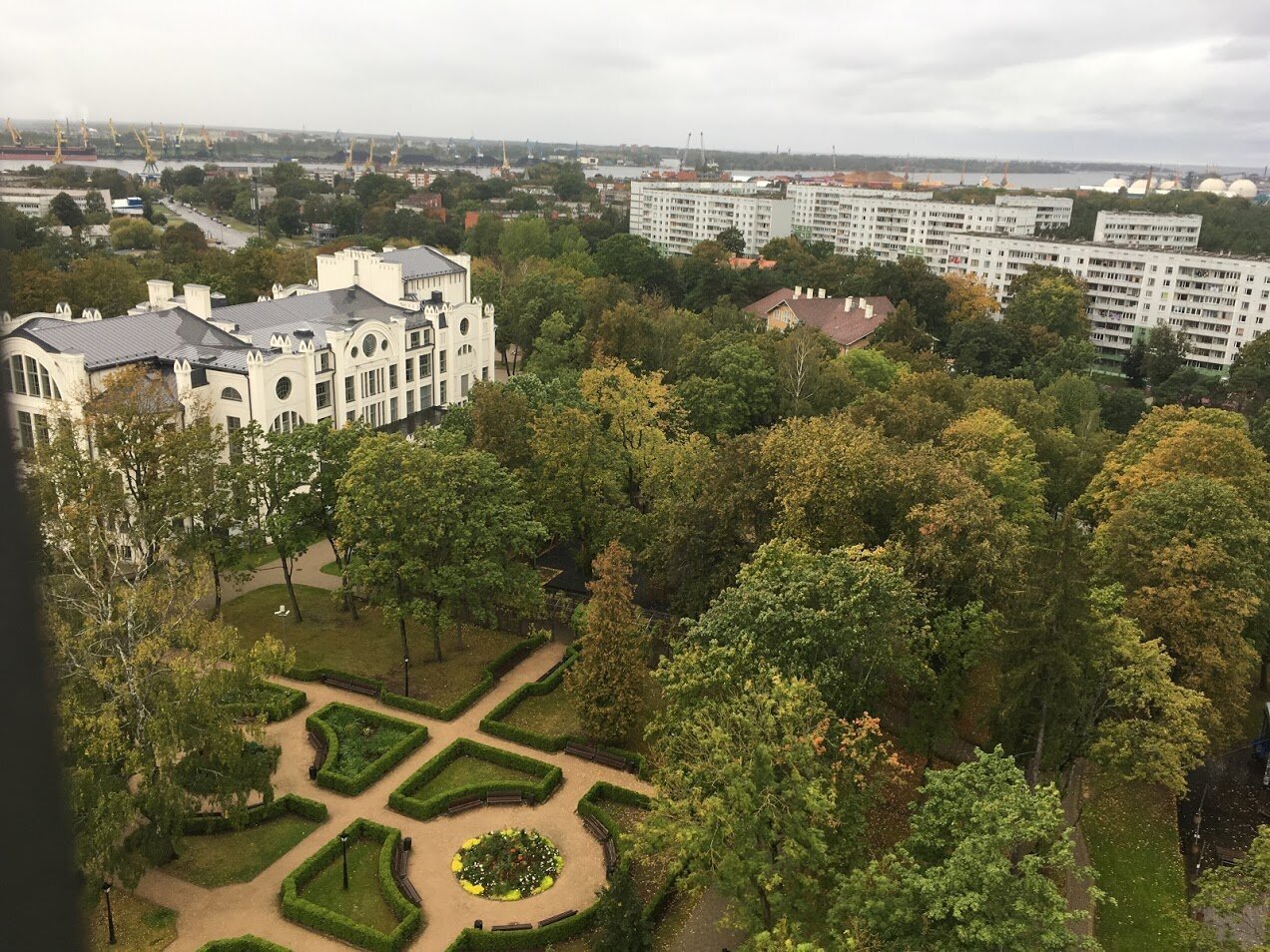 View of the palace, residential area and the Freeport of Riga from the observation tower of Ziemelblazma Park