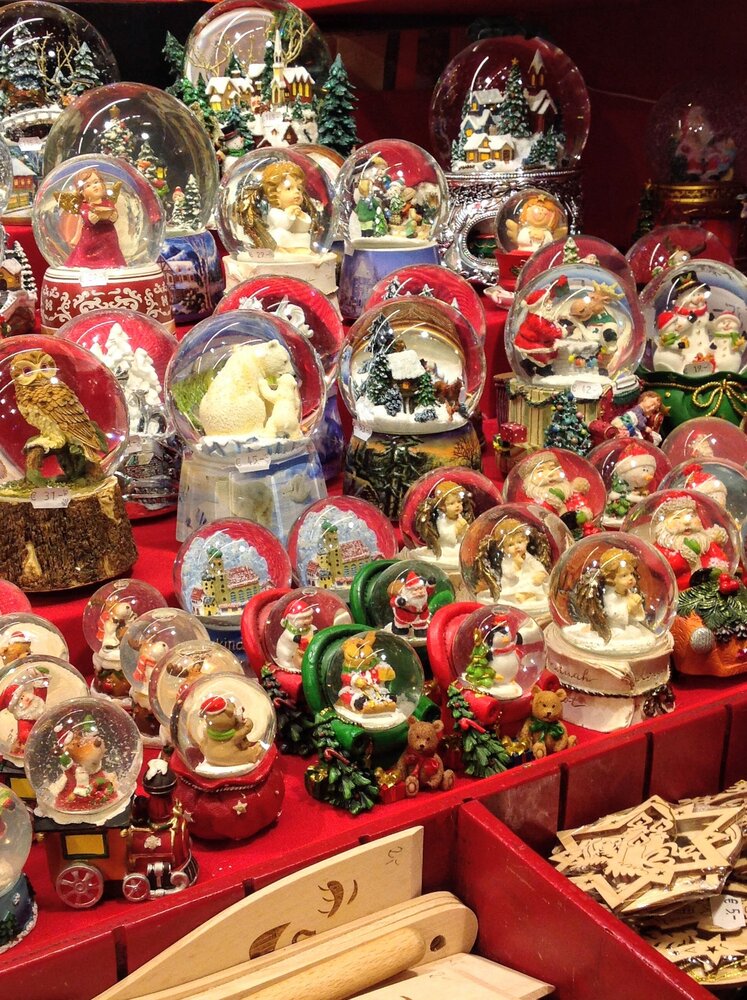 Huge selection of snow globes with figures inside